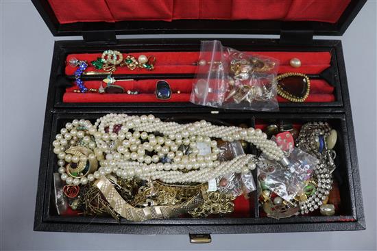 A box of assorted costume jewellery.